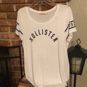 NWOT Vintage Hollister curved hem top. 1922 logo on sleeves.  Medium.